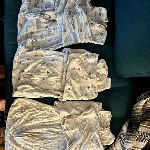 3 cotton Halo sleep sacks in different patterns. For 3-6 months.